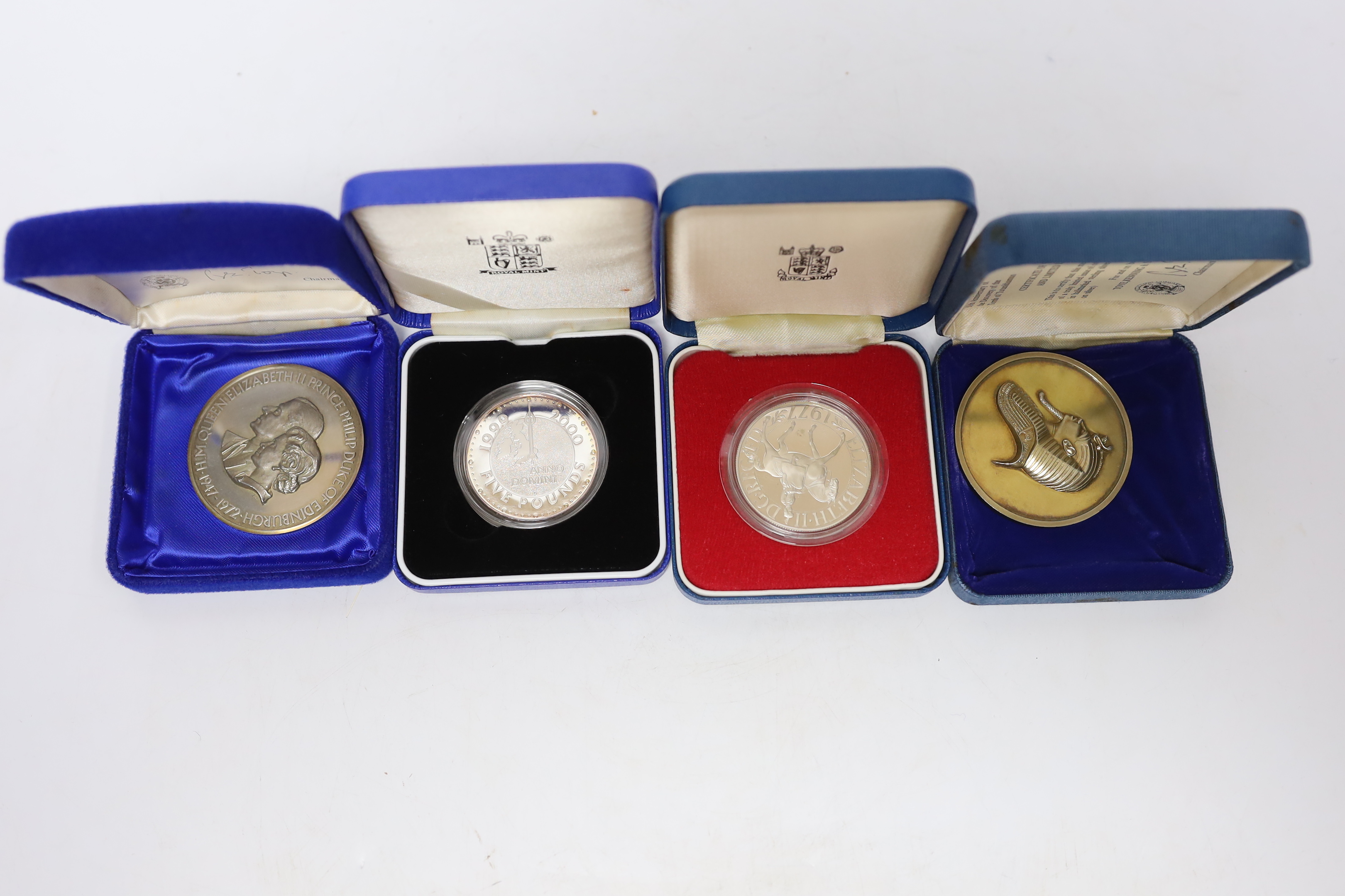 Nineteen silver commemorative coins, medals or silver ingots, including Australia $1 koala 2012p, NGC graded MS 69, People’s Republic China 10 yuan 1995, PCGS graded MS 68 and 10 yuan 2004, PCGS graded MS 69